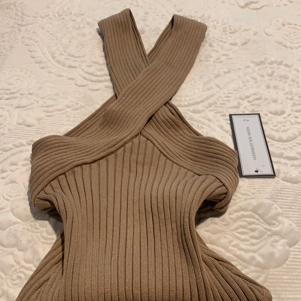 woman’s crisscross knit bodysuit